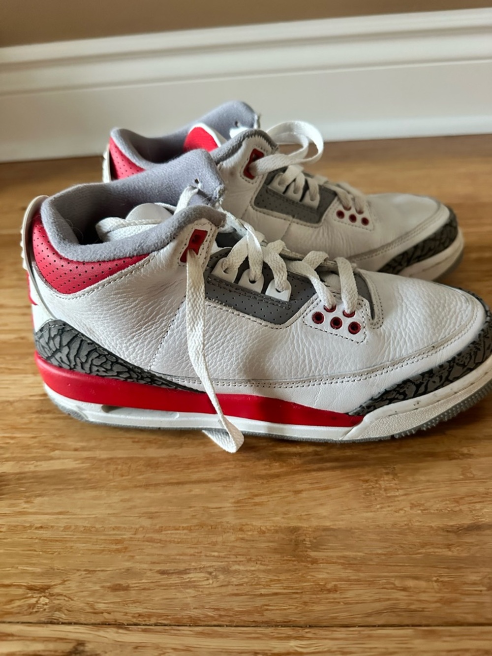 Nike Air Jordan’s Kids White Sneakers with Red and Gray Accents